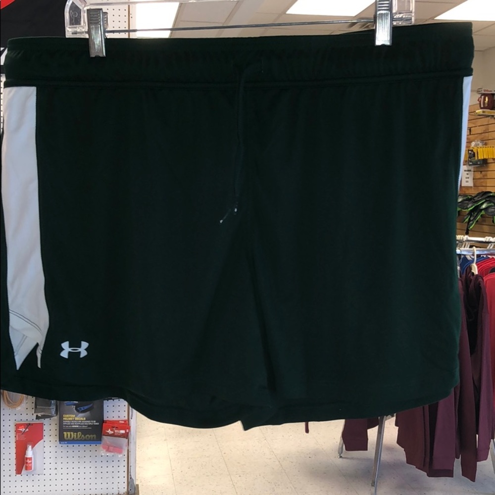 Green and white Under Armour shorts